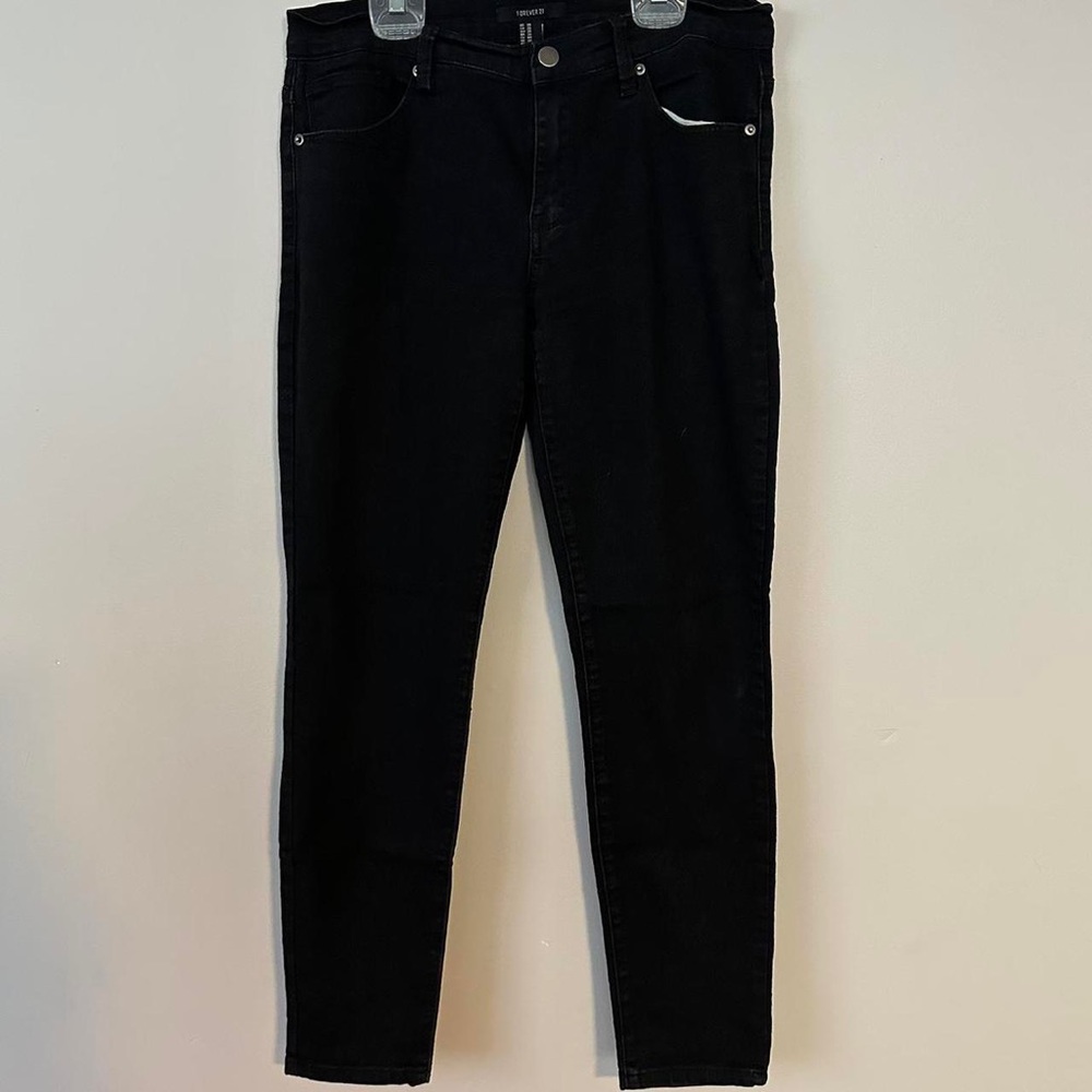 30” forever 21 black skinny jeans
runs small